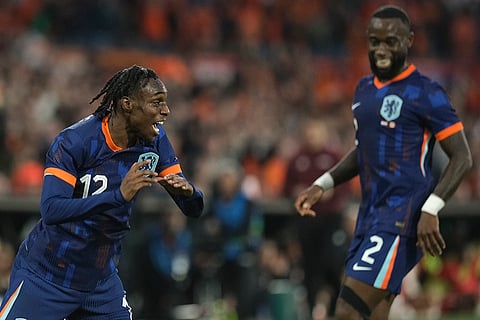 Jeremie Frimpong celebrates scoring a goal against Canada